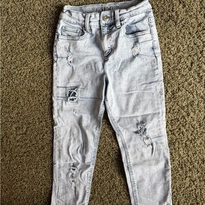 Justice Skinny Jeans in Light Blue Distressed